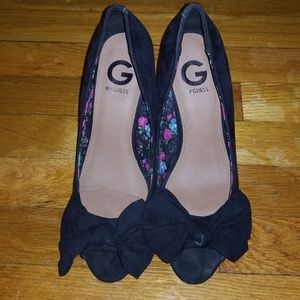 Black peep-toe wedge shoes
